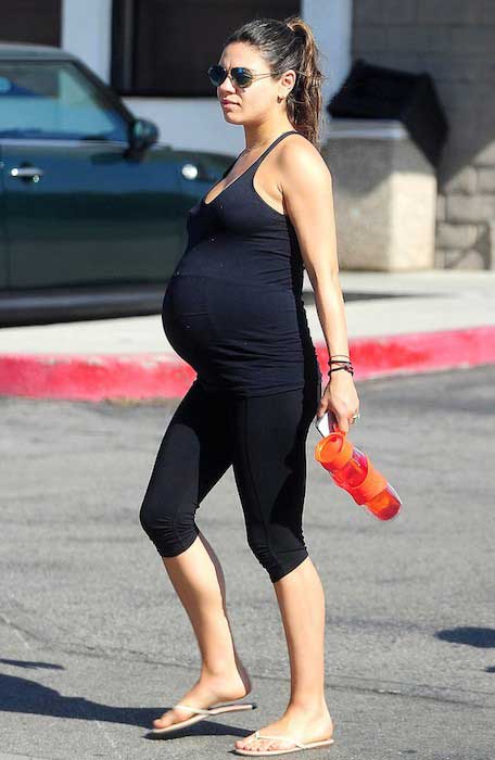 Mila Kunis practiced Prenatal Yoga in tight black workout gear on ...