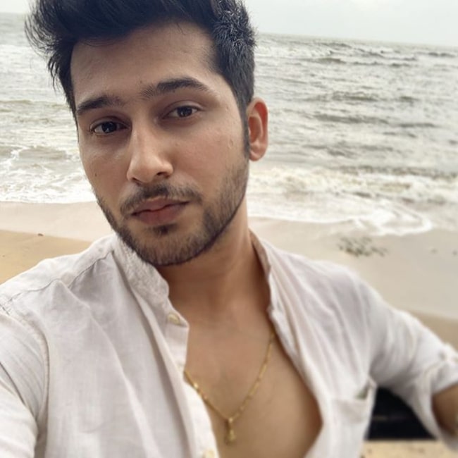 Namish Taneja in a candid selfie at a beach in 2019