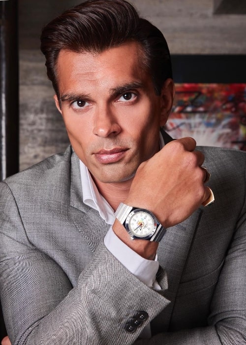 Karan Singh Grover showing his Timex watch in March 2022