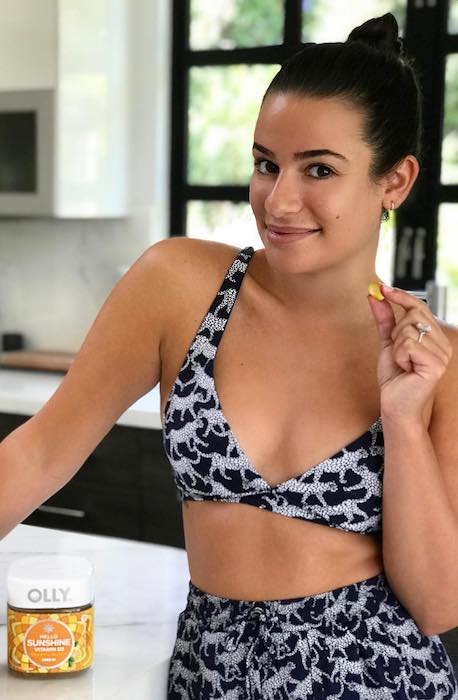 Lea Michele with Olly Nutrition's Vitamin tablets in July 2018