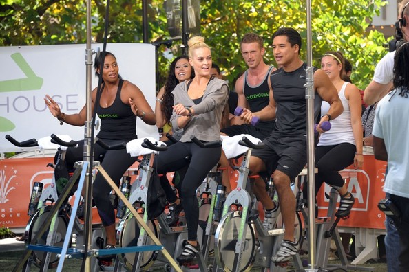 Peta Murgatroyd and Mario Lopez doing workout on the set of Extra