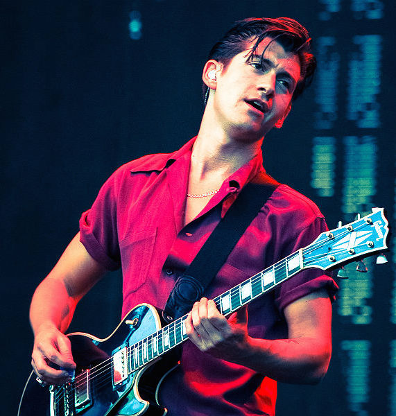 Alex Turner playing guitar