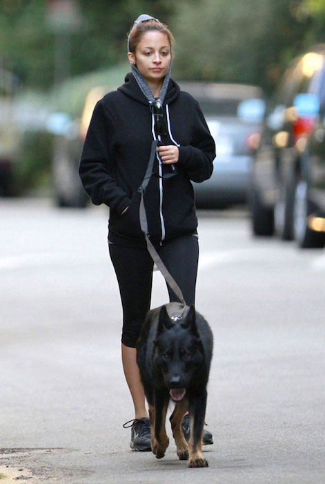 Nicole Richie walking with her dog Iro
