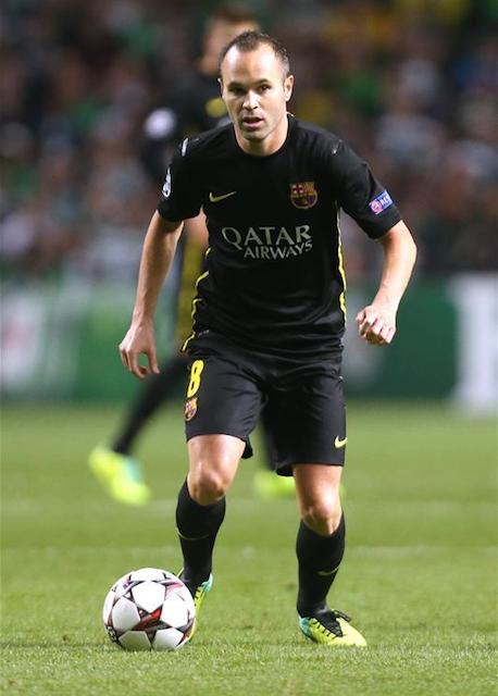 Andres Iniesta dribbling the ball