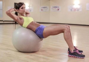 Rachel Nicole working out on exercise ball.