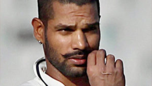Shikhar Dhawan twirling his mustache.