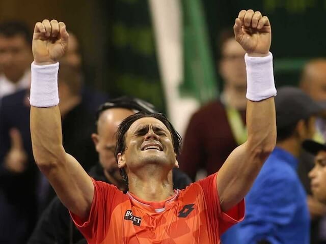 David Ferrer celebrating his tournament winning victory over Tomáš Berdych at Qatar ExxonMobil Open 2015