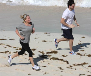 Hilary Duff training on the beach with her husband Mike Comrie