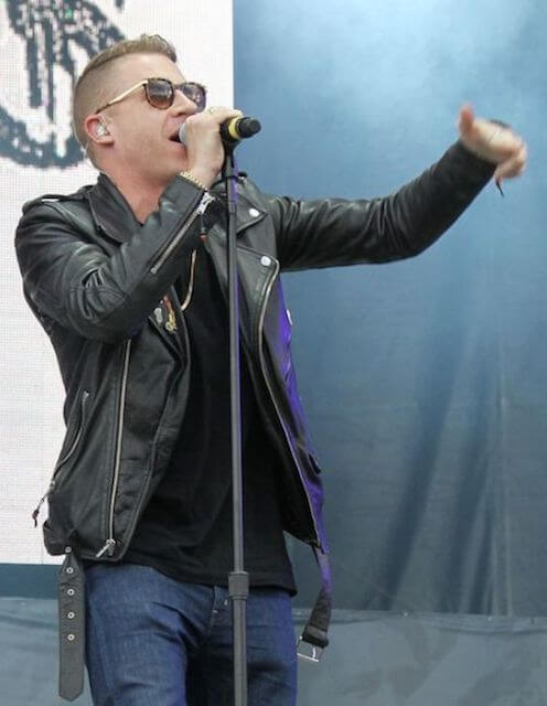 Macklemore performing at an event