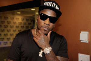 Young Jeezy wearing golden watch