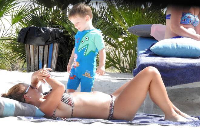 Coleen Rooney and Klay Rooney on the beach in Portugal