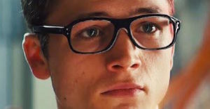 Taron Egerton wearing glasses - Featured Image