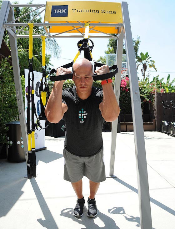 Celebrity trainer, Harley Pasternak leads a group workout using Fitbit Charge HR on August 18, 2015 in Los Angeles, California