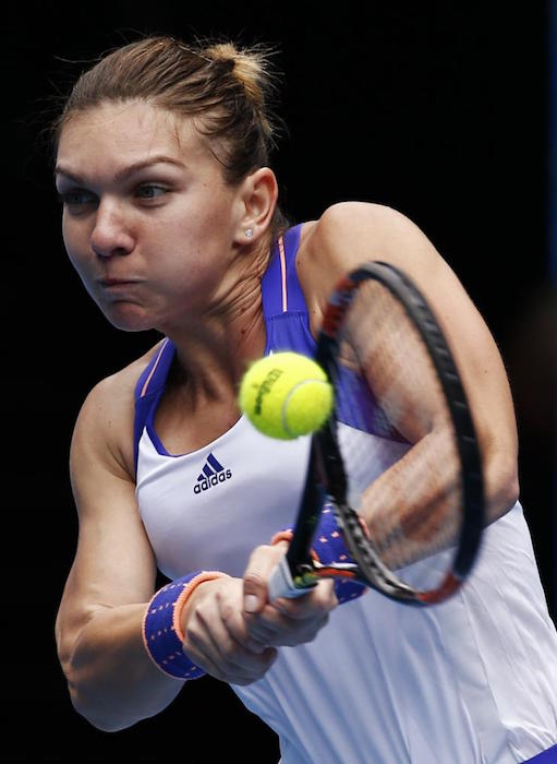 Simona Halep playing a shot in a match