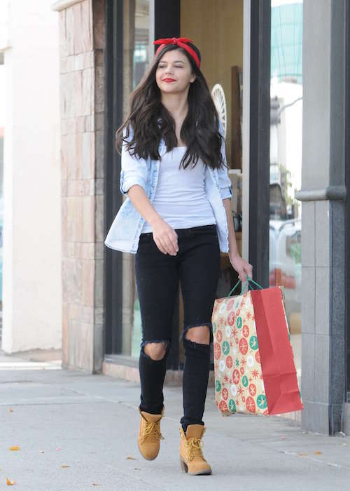 Amber Montana in ripped jeans during a Christmas shopping in December 2015