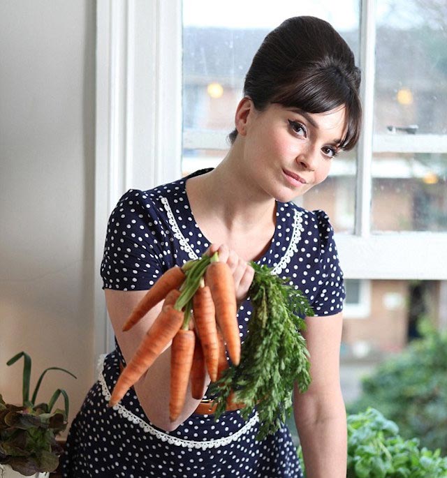 Gizzi Erskine holding carrots