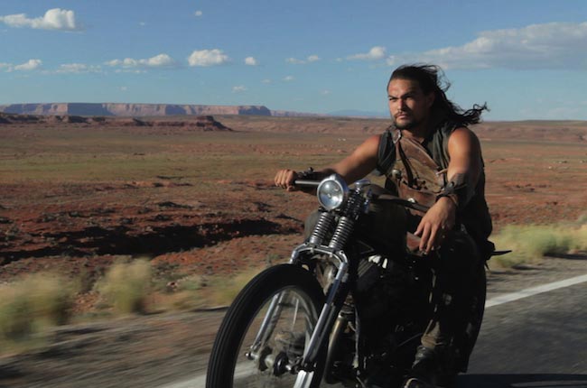 Jason Momoa riding a motorcycle