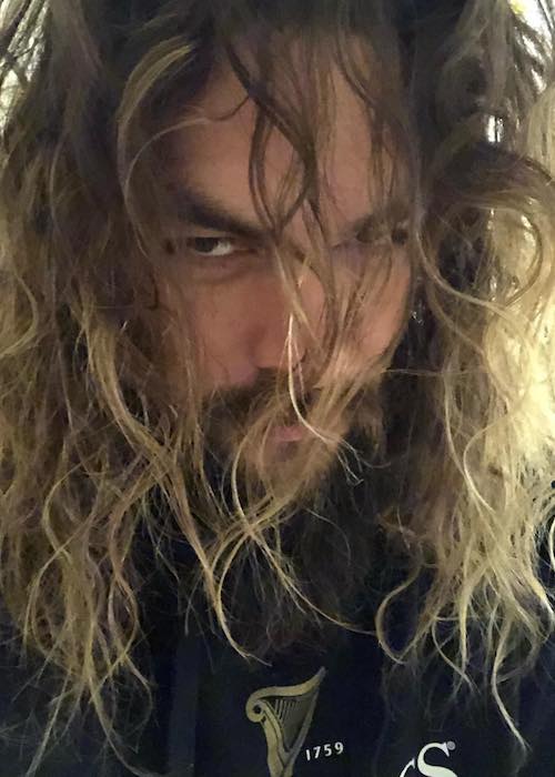 Jason Momoa showing his long hair in March 2018