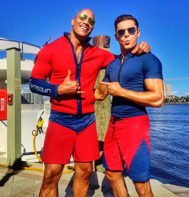 Zac Efron and The Rock on the movie set