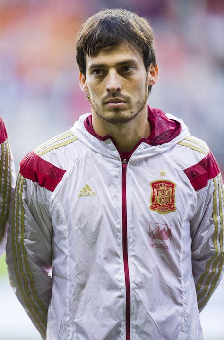 David Silva listening the intonation of the Spanish anthem during a match between Spain and Slovakia on September 5, 2015 in Oviedo, Spain