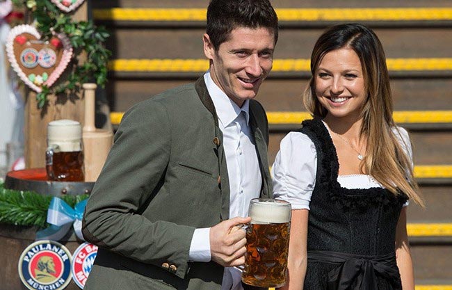 Robert Lewandowski and Anna Stachurska having fun at the 182nd Oktoberfest in Munich, Germany 