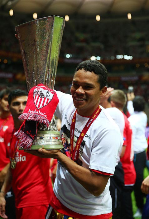 Carlos Bacca with the trophy after his team FC Sevilla won the UEFA Europa League Final match against FC Dnipro on May 27, 2015