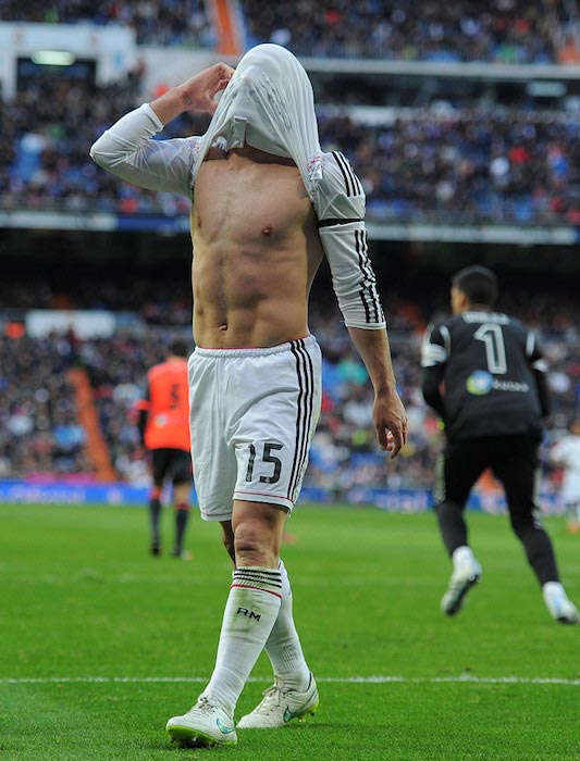 Dani Carvajal pulled up his shirt after a missed attempt during a match between Real Madrid and Real Sociedad on January 31, 2015