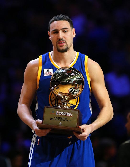 Klay Thompson with trophy after winning the Foot Locker Three-Point Contest at the 2016 NBA All-Star Weekend on February 13, 2016