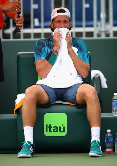 Lucas Pouille during a match against Gilles Simon at Miami Open on March 29, 2016 in Key Biscayne, Florida