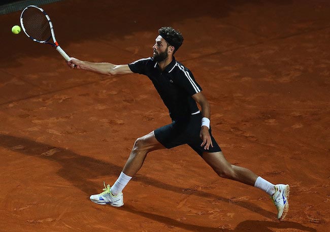 Benoit Paire returns the shot to Stan Wawrinka during a match of The Internazionali BNL d’Italia 2016 on May 10, 2016