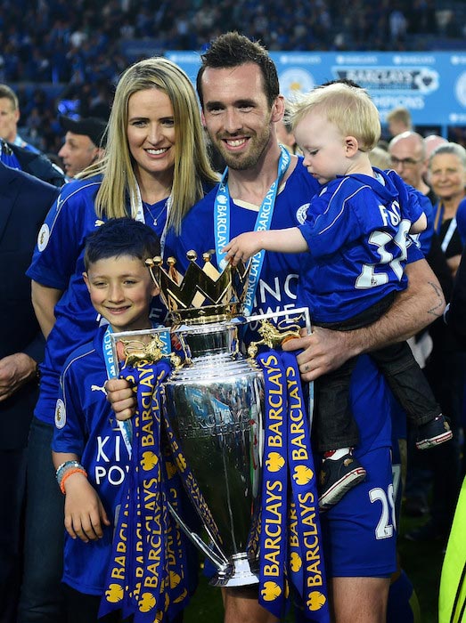 Christian Fuchs with his family taking a picture after the Premiere League match between Leicester City and Everton on May 7, 2016