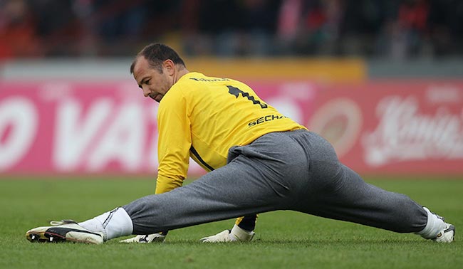 Gabor Kiraly doing his pre-match stretching