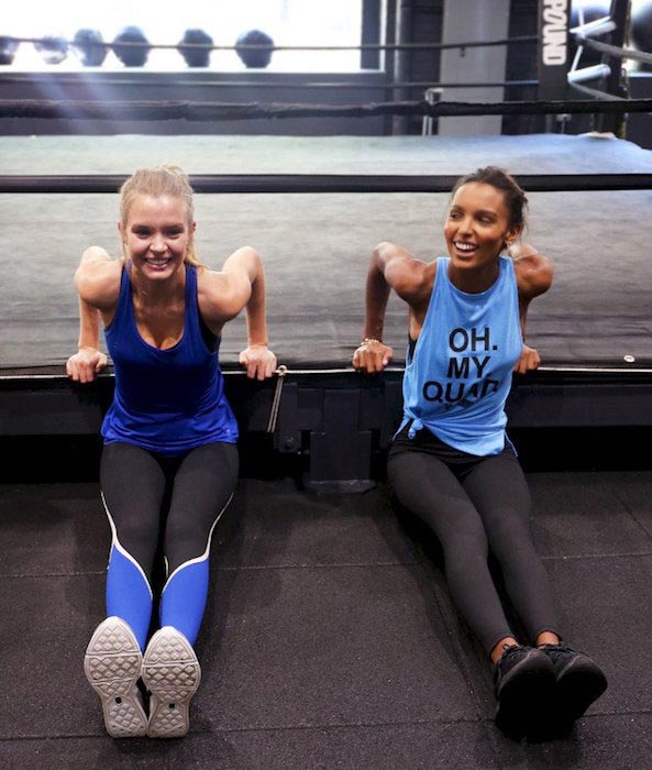 Josephine Skriver and Jasmine Tookes doing dips at Dogpound