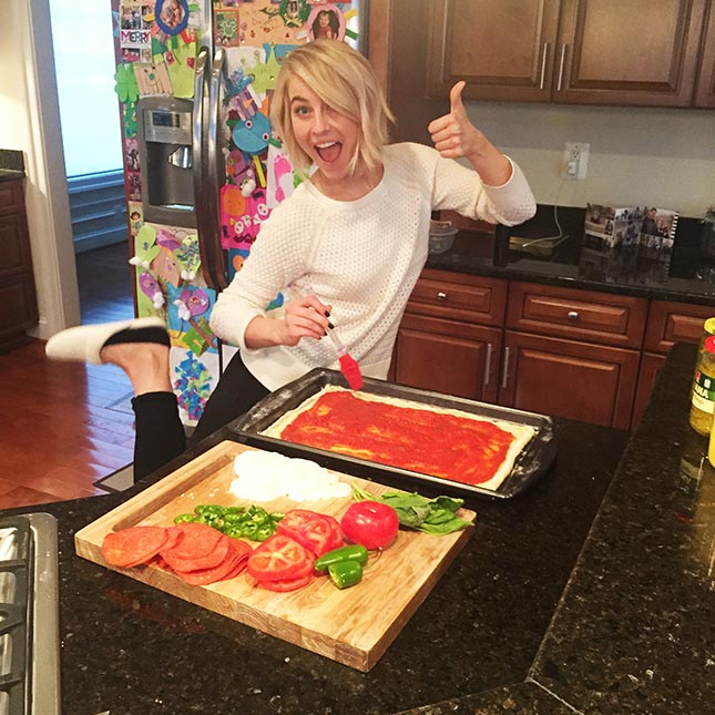 Julianne Hough making her food in the kitchen