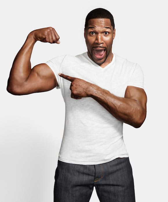 Michael Strahan showing his bicep