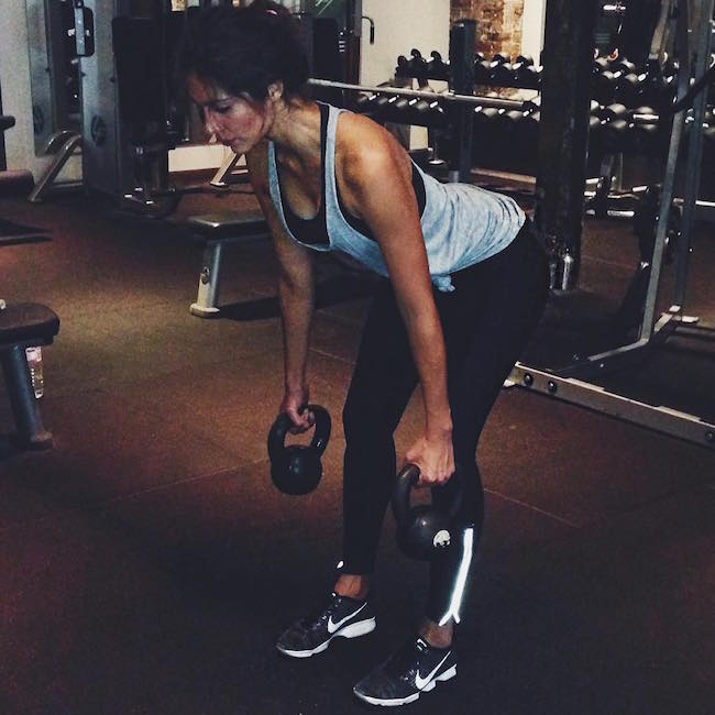 Pia Miller working out with kettlebell