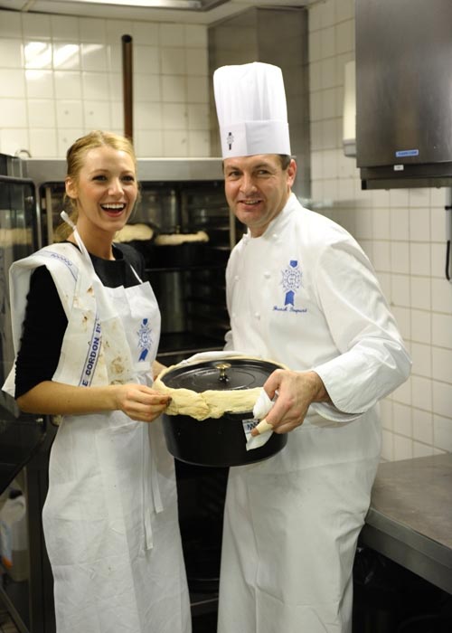 Blake Lively with a chef in kitchen