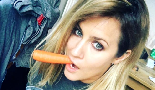 Caroline Flack having carrot