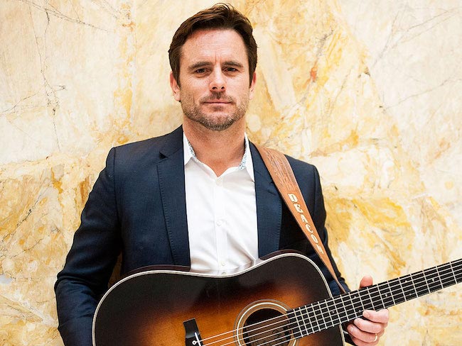 Charles Esten posing for a portrait in Union Station, Washington DC in May 2014