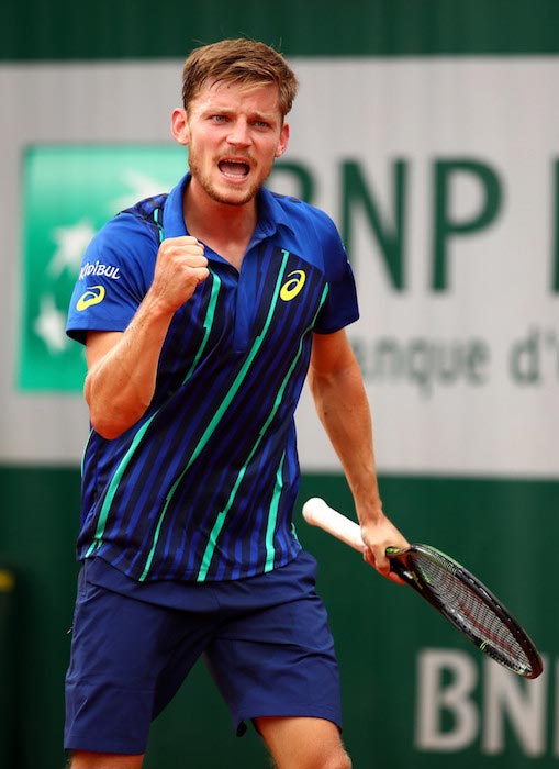 David Goffin celebrates a point in a match against Dominic Thiem at 2016 French Open on June 2, 2016