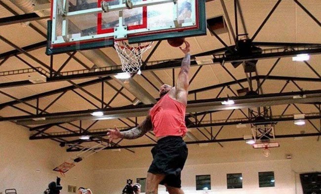 Hafthor Julius Bjornsson playing basketball