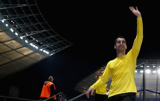 Henrikh Mkhitaryan waves to his fans after the DFB Cup semi final match against Hertha BSC on April 20, 2016