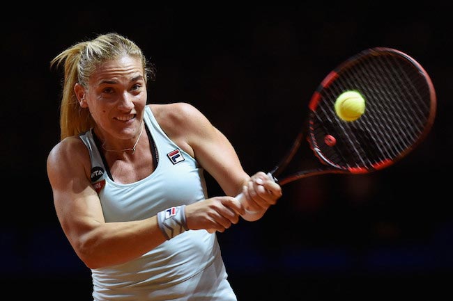 Timea Babos plays backhand during a match against Sabine Lisicki on April 18, 2016 in Stuttgart, Germany