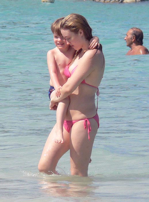 Ashley Johnson in bikini at St. Barths beach in France on January 19, 2012