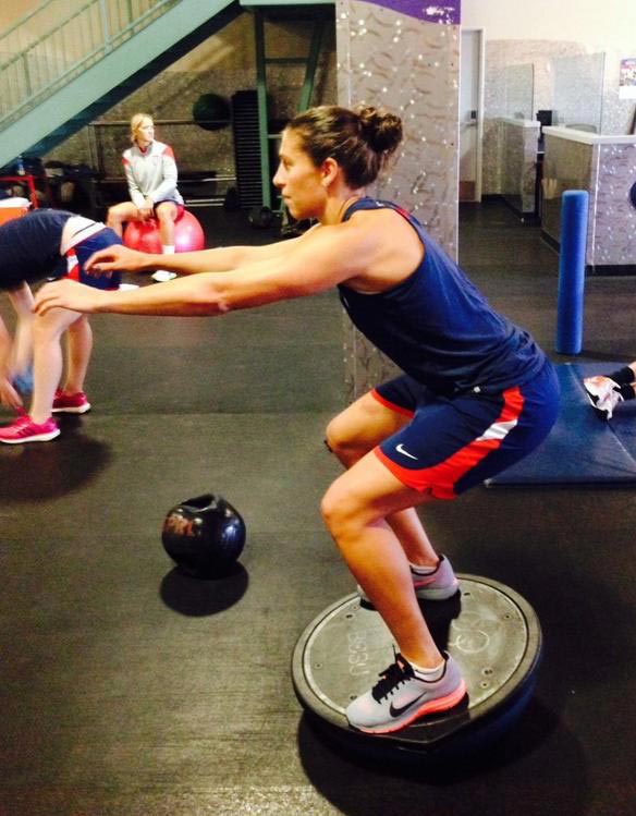 Carli Lloyd exercising in gym