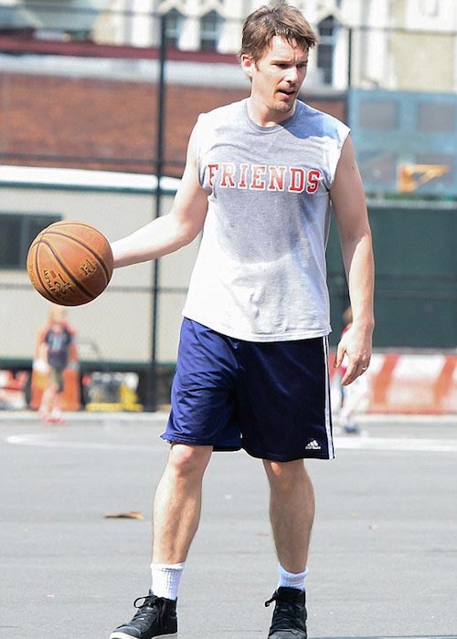 Ethan Hawke demonstrates his fitness with a game of basketball in NYC in 2016