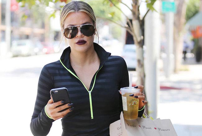 Khloe Kardashian shopping and having a drink