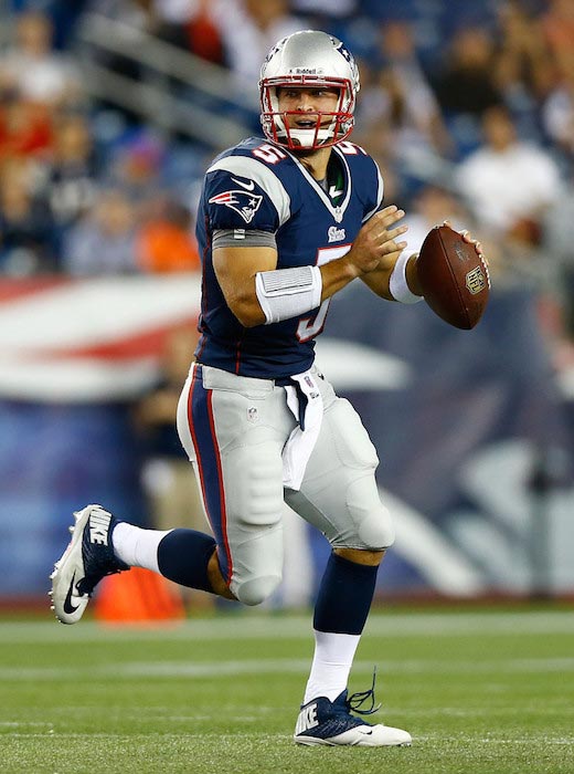 Tim Tebow playing for the New England Patriots in a match against Tampa Bay Buccaneers on August 16, 2013