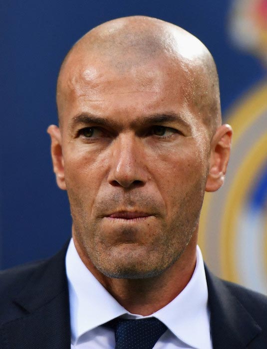 Zinedine Zidane looks during the UEFA Champions League Final match between Real Madrid and Atletico Madrid on May 28, 2016 in Milan