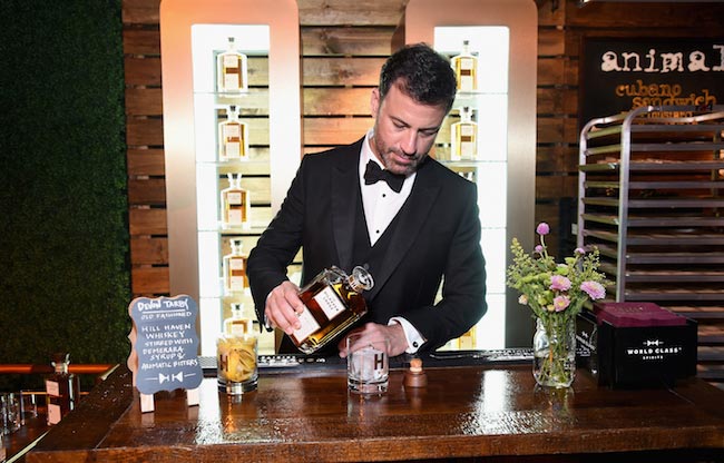 Jimmy Kimmel pouring alcohol to the glass